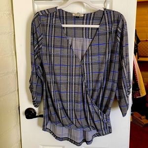 Plaid crossover knit top